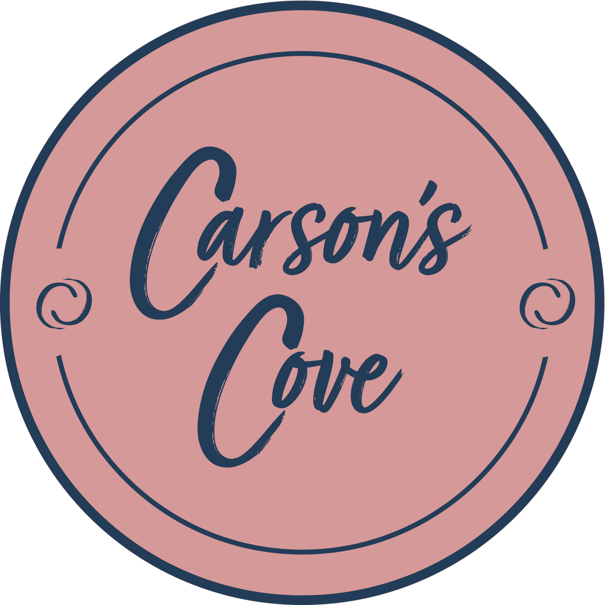 a circular logo with the text "Carson's Cove" written in a cursive font.