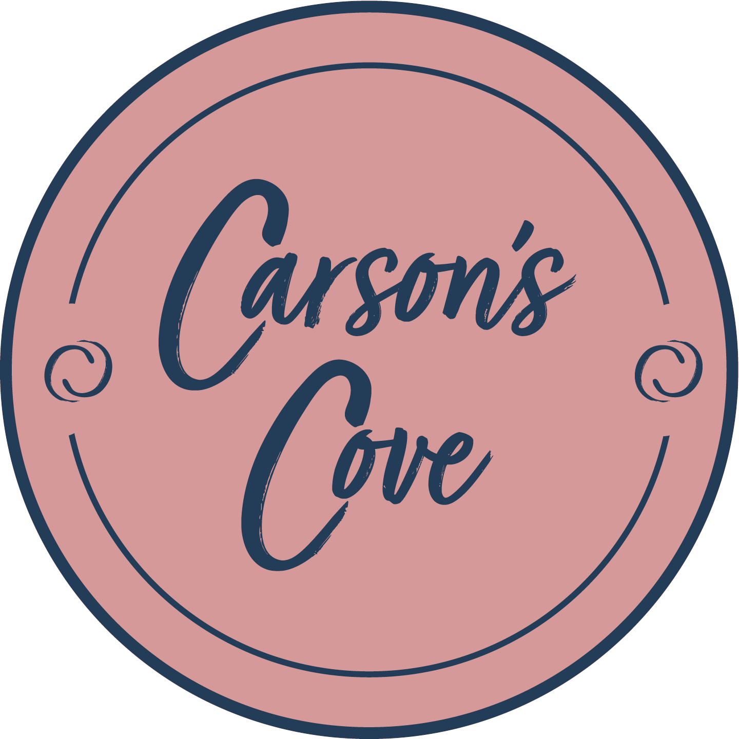 a circular logo with the text "Carson's Cove" written in a cursive font.