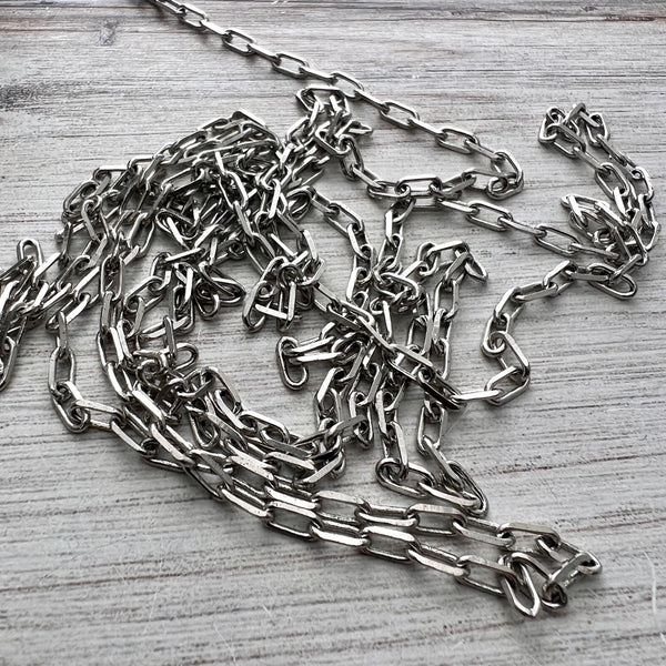 Load image into Gallery viewer, Silver Minimalist Clip Chain by the Foot, Delicate Soldered Chain 7x3mm, Jewelry Supplies, PW-2055
