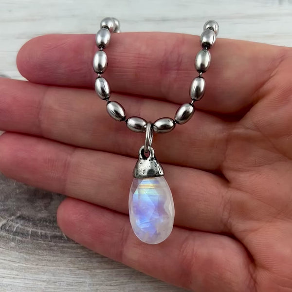 Load and play video in Gallery viewer, White Rainbow Moonstone Pear Faceted Briolette Drop Pendant with Antique Pewter Bead Cap, Gemstone, Jewelry Making Artisan Findings, PW-S044
