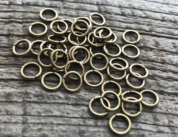 Load image into Gallery viewer, 6mm Jump Rings, Gold Jump Rings, Antiqued Jump Rings, 50 jump rings, GL-3004
