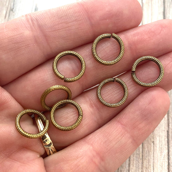 Load image into Gallery viewer, 11mm Large Antiqued Gold Jump Rings, Textured Jump Ring, Brass Jump Rings, 10 rings, GL-3002
