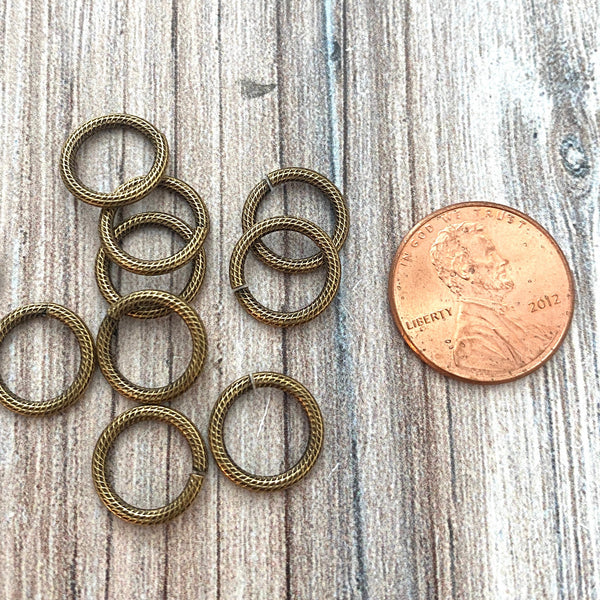 Load image into Gallery viewer, 11mm Large Antiqued Gold Jump Rings, Textured Jump Ring, Brass Jump Rings, 10 rings, GL-3002
