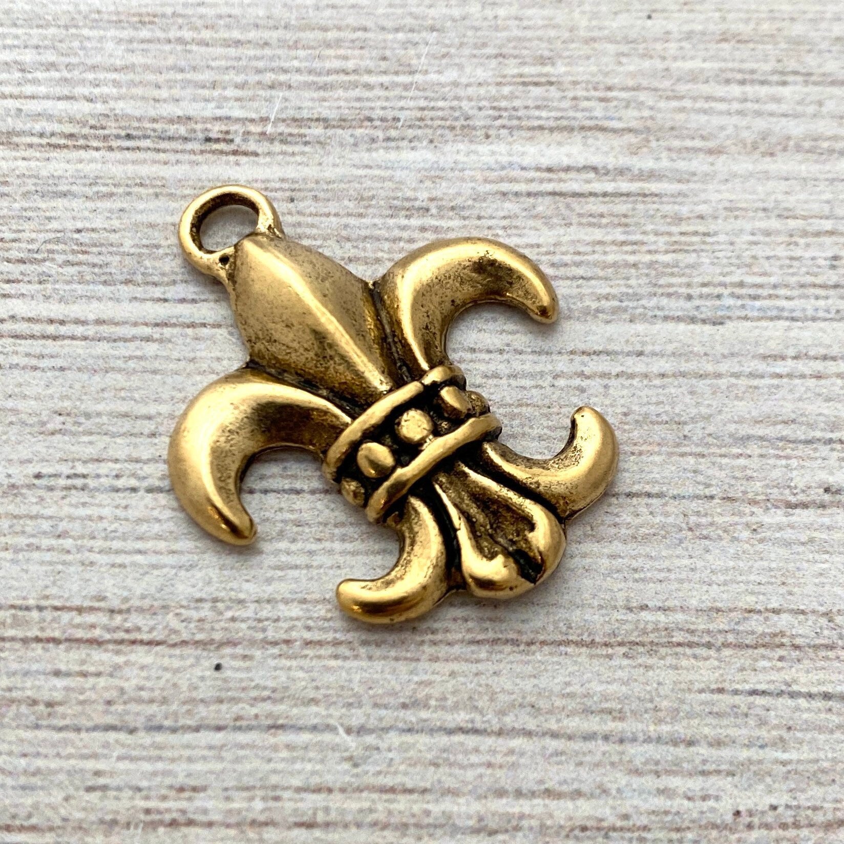 Gold fleur clearance de lis charm