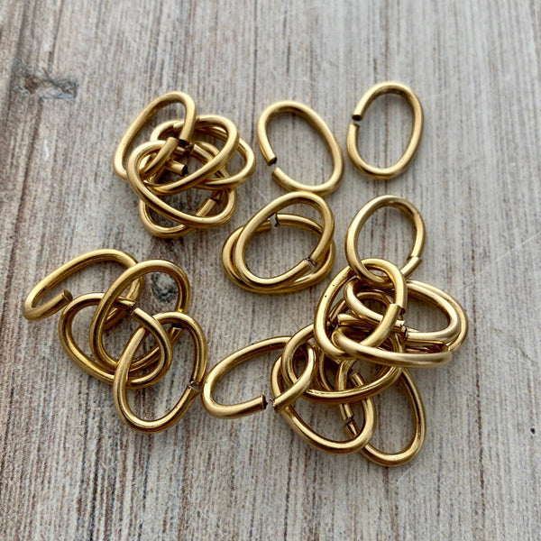 Load image into Gallery viewer, 9x13mm Oval Jump Rings, Antiqued Gold Brass, 20 rings, GL-3008
